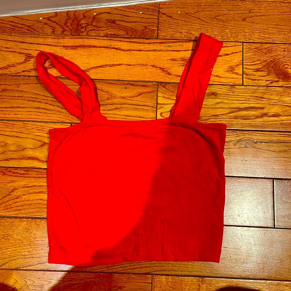 Red Square neck top.